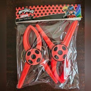 NWT Miraculous Ladybug Beach Towel Clips. Culturefly.